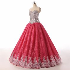 Step into a world of elegance and fantasy with this enchanting Pink Ball Gown. Expertly crafted to capture hearts, the bodice is adorned with exquisite lace and sequins, creating a dazzling effect that glistens with every movement. The back corset detailing not only adds a touch of vintage charm but also ensures a perfect fit that accentuates your natural silhouette.The voluminous skirt flows effortlessly to the floor, embellished with scrolling floral appliqués that add a layer of sophisticatio Coral Quinceanera Dresses, Quinceanera Dresses Pink, Pink Ball Gown, Dresses For Pregnant Women, Corset Gown, Black Mermaid, Sweet 16 Dresses, Pageant Dress, Celebrity Red Carpet