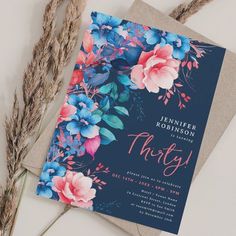 an elegant floral birthday party with blue, pink and red flowers on the front card