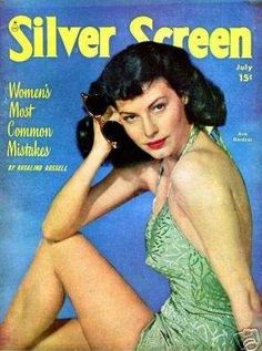 the cover of silver screen magazine featuring a woman in green dress