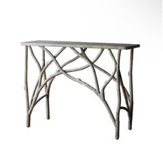 a wooden table with branches on it