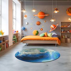 a bedroom with an orange bed and planets on the wall