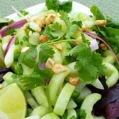 a white plate topped with lettuce and radishes