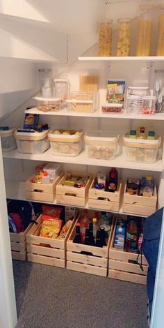 the pantry is stocked with lots of food