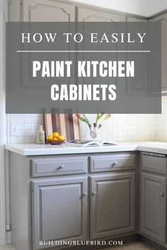 a kitchen with gray cabinets and white counter tops, the words how to easily paint kitchen cabinets