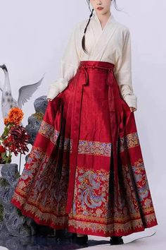 Fabric: Polyester, Cotton Color: Red Waist: High Waisted Feature: Print Style: Chinese Style Clothing Type: Skirt Include: Skirt*1 (Any of the accessory is not included.) Skirt Size Chart Size(IN) Dress Length Dress Waist S 36.22 35.43 M 37.80 37.01 L 39.37 38.98 XL 40.94 41.34 Size(CM) Dress Length Dress Waist S 92 90 M 96 94 L 100 99 XL 104 105 Shirt Size Chart Size(IN) Shoulder Width Sleeve Length Bust Clothing Length S 16.54 20.47 38.58 24.80 M 16.93 20.87 40.16 25.20 L 17.32 21.26 41.73 25.59 XL 17.72 21.65 43.31 25.98 Size(CM) Shoulder Width Sleeve Length Bust Clothing Length S 42 52 98 63 M 43 53 102 64 L 44 54 106 65 XL 45 55 110 66 Hanfu Skirt, Magical Fashion, Chinese Clothing Traditional, Chinese Fancy Dress, Maroon Outfit, Oc Board, Chinese Clothing, Print Style, Dream Clothes