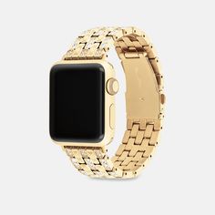 Made exclusively for use with the 38mm 40mm and 41mm Apple Watch® this dazzling gold tone link bracelet strap is etched with our Signature and detailed with pavé crystals for a sparkly touch. | Coach Apple Watch® Strap, 38 Mm, 40 Mm And 41 Mm - Women's - Gold Luxury Gold Metal Watch Bands, Luxury Gold Watch Accessories With Bracelet Strap, Elegant Gold Metal Apple Watch Band, Classic Gold Stainless Steel Apple Watch Band, Elegant Gold Stainless Steel Apple Watch Band, Elegant Gold Diamond Watch With Rhinestones, Luxury Gold Bracelet Strap Watch Bands, Elegant Gold Watch Accessories With Solid Link Construction, Elegant Gold Watch Accessories With Solid Link