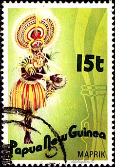 a postage stamp with an image of a man in traditional dress and the words papua new guinea on it