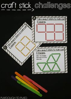 three different task cards with colored pencils next to them on a black table top