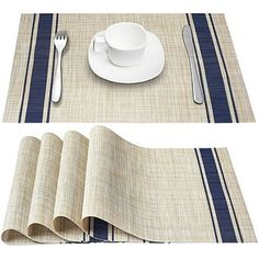 placemats with blue and white stripes on them are next to a cup, saucer, fork and spoon