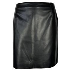 Presenting a fabulous black vegan leather Gianni Versace Couture mini skirt, designed by Gianni Versace. From 1996, this shiny faux leather skirt is a must-have essential for any wardrobe! Approximate measurements: Size - IT44 / US10 28.5" waistband 39" hips 18" waistband to hem 49% vinyl, 27% polyester, 19% polyurethane, 5% silk Versace Couture, Versace Brand, Printed Pleated Skirt, Skirt And Top Set, Leather Mini Skirt, Black Vegan, Faux Leather Skirt, Gianni Versace, Leather Mini Skirts