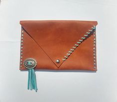 Caramel Tan Leather Clutch, Leather Purse with fringe, Leather Clutch, Turquoise Clutch Purse, Eveni Purse With Fringe, Clutch Purse Evening, Leather Earrings, Leather Purse, Coach Dinky Crossbody, Leather Clutch, Clutch Purse, Tan Leather, Leather Purses