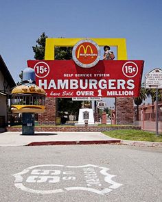 the sign for hamburgers in front of a mcdonald's restaurant