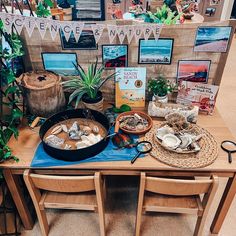 a table topped with lots of clams and other items on top of wooden tables