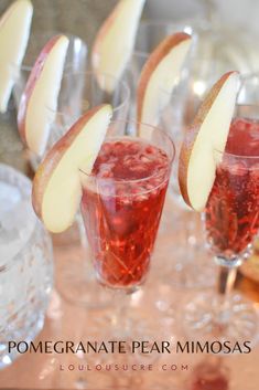 several glasses filled with different types of drinks