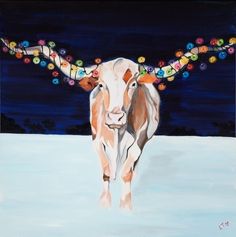 a painting of a brown and white cow with colorful beads on its horns standing in the snow