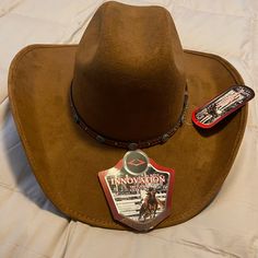 Wool And Felt Cowboy Hat, Never Worn, Camel Brown. Western Brown Hat, One Size Fits Most, Western Brown Hat One Size Fits Most, Brown Western Hat One Size Fits Most, Brown Country Cap Hat, Brown Country Cap Style Hat, Brown Cap For Rodeo, Brown Country Style Felt Hat, Brown Country Style Cap, Brown Hat For Western-themed Events