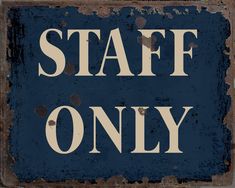 a blue sign that says staff only on it