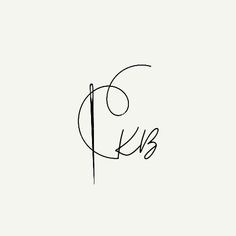 the letter k is written in cursive handwriting on a white background with black ink