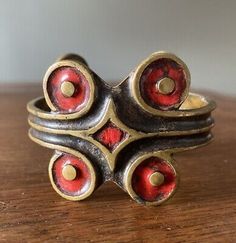 ad eBay - Super hip, quite hard to find, St Luc cuff bracelet. This renowned French modernist jewelry designer is highly collected within the jewelry world. This piece is fresh out of an incredible estate collection. The bronze cuff with enamel decoration is completely hand made and has an excellent old patina. Condition is great. One of these with blue enamel rather than red just sold on 1stDibs for $475. Screenshots at end of listings photos show this example and a few others. This cool… Vintage Spoon Jewelry, Rivet Jewelry, Designer Costume Jewelry, Just Sold, Modernist Jewelry, Vintage Spoons, Spoon Jewelry, Buckle Bracelet, French Designer