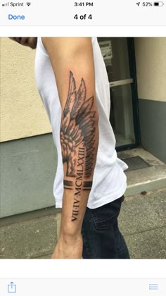 a man with a tattoo on his arm