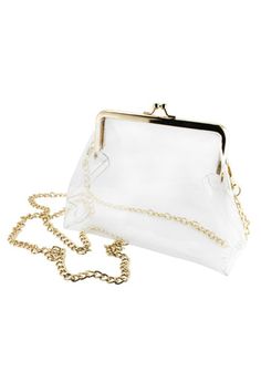 This cross-body features a clear PVC body with gold hardware accents and a gorgeous timeless gold chain. The main compartment features a classic kiss lock closure for securing your personal items within. · Measures 7.25" x 5.5” x 2" Capri Design, Clear Stadium Bag, Clear Handbags, Stadium Bag, Clear Purses, Monogram Styles, Navy And Brown, Clear Bags, Small Crossbody Bag