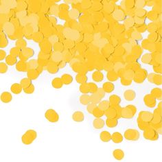 yellow confetti falling down into the air