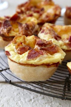 some bacon and cheese muffins on a wire rack