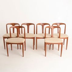 set of six danish teak dining chairs with upholstered seats