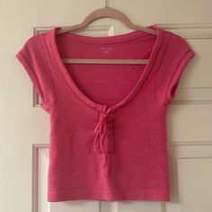 Pink Out From Under Scoop Neck Top. Stretchy And Super Cute. Lace Up And Bow In The Front. Super Stretchy. Adorable For Spring And Summer. Never Worn. No Stains Or Rips. Nwot (New Without Tags). Smoke Free Home. Feel Free To Ask Any Questions! I Am Open To All Offers. Pink Short Sleeve Cotton Knit Top, Summer Stretch T-shirt By Urban Outfitters, Pink Cotton V-neck Knit Top, Casual Cotton Knit Top With Scoop Neck, Casual Scoop Neck Knit Top, Casual Pink Crop Top From Urban Outfitters, Urban Outfitters Pink Casual Crop Top, Trendy Cotton Knit Top With Scoop Neck, Casual Short Sleeve Crop Top By Urban Outfitters