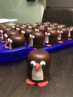 there are many chocolate penguins on the table