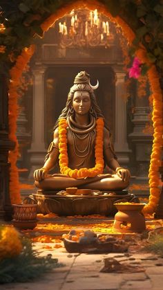 the statue is sitting in front of an archway with flowers and candles around it, surrounded by orange garlands