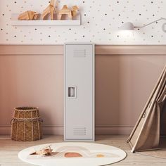 a white locker sitting in the corner of a room next to a teepee tent