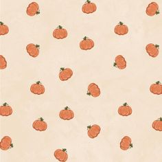 an orange pumpkin pattern on a beige background