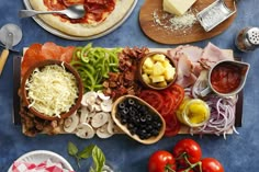 an assortment of food is laid out on a table