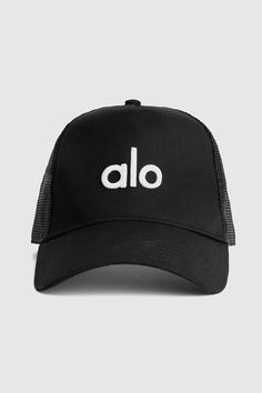 The elevated version of your classic cap, our District Trucker Hat has an Alo embroidered logo and mesh back with adjustable snap closure. Embroidered logo patch Mesh detail Adjustable snap back closure Alo Cap, Alo Hat, Trucker Hat Outfit, Hat Outfit, Workout Tights, Mens Gear, Tank Top Bras, Womens Capris, Outfits With Hats