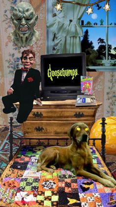 a dog laying on top of a bed in front of a tv with the words goosebumps written on it