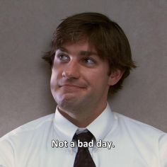 a man wearing a shirt and tie with the words not a bad day