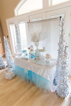 a table with blue and white decorations on it