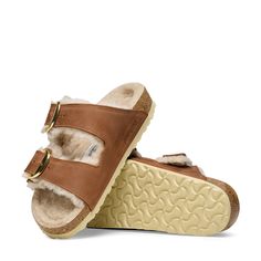 Birkenstock Arizona Big-Buckle Shearling-Lined Sandals in Cognac/Sandcastle Oiled Leather Shearling, Size IT 40: It’s the iconic two-strap style you know and love, now lined with a plush layer of shearling to keep your feet warm during the cool months. Topped with big shiny gold-tone buckles, they make fabulous house shoes, if you ask us. Leather, shearling, cork, EVA. Birkenstock Arizona Big Buckle, Arizona Big Buckle, Womens Casual Boots, Mens Boots Casual, Women's Shoes Accessories, Hiking Sandals, Waterproof Winter Boots, Pull On Boots, Calf Socks