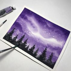 an image of the night sky with stars and trees on it, as well as paintbrushes