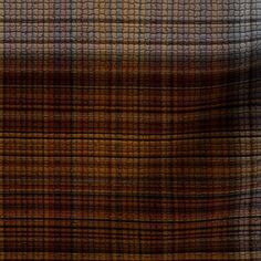 an orange, brown and black plaid fabric