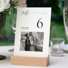 a table number with a photo on it