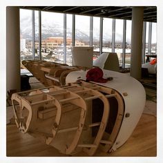 the boat is being built and ready to be put on display in the building's lobby