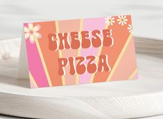 a card with the words cheese pizza on it