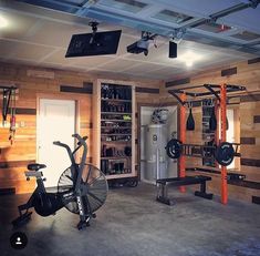 a home gym with several exercise bikes and equipment in the room, including an exercise bike