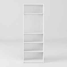 an empty white bookcase on a plain surface with no one in it or someone out front