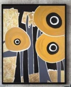 an abstract painting with black and yellow flowers on the bottom half of it, against a gray wall