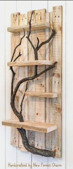 a wooden shelf that has some branches on it