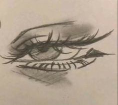 a drawing of a woman's eye with long eyelashes