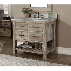 two mirrors are above the double sink vanity in this rustic bathroom with wood flooring